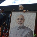 wShri Narendra Modi with Gifted Collage Photograph by at Convention by Vivekananda Yuva Parishad- Vibrant Gujarat Summit 2013-Gandhinagar
